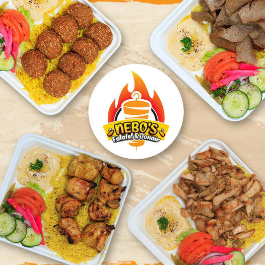 Nebos Falafel & Donair platters with chicken shawarma, falafel, hummus, rice, and fresh vegetables served at a halal Middle Eastern restaurant in Saskatoon.